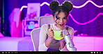 Woman, content creator and microphone or talking on live streaming with slime, whisper and sticky sounds. Neon, influencer or vlogging for social media followers with sensory audio, audience or relax