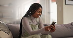 Girl, phone and laughing with reading on sofa for social media meme, funny online video or text message joke in home. Gen z, person or scroll on smartphone in lounge for gossip site or comic web post
