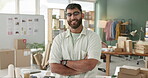 Fashion designer, man and arms crossed in office for startup or small business with courier or logistics planning. Face or portrait of clothes seller, supplier or young entrepreneur with confidence