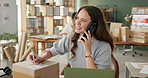 Box, phone call and writing with woman in office for distribution, logistics or supply chain. Delivery, ecommerce and laptop for online order with employee at work for commercial export or import