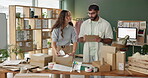 Business, people and startup with boxes in office, man and clipboard with woman packaging order in creative workplace. Checking, distribution parcels and products for ecommerce, employee and talking