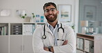 Face, male doctor and confident for healthcare, service and advice as medical professional in hospital or clinic. Man, happy and friendly for support, help or consultation as  physician for wellness