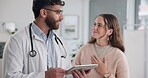 Male doctor and tablet with woman, patient and advice for wellness or telehealth service in hospital or clinic. Healthcare professional, tech and people in office for diagnosis, research or support