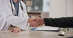 Handshake, medical and patient with doctor in consultation for thank you, welcome or greeting. Trust, checkup and healthcare worker shaking hands for support of diagnosis with woman in clinic.