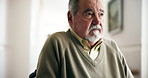 Elderly man, wheelchair and thoughtful by window in nursing home, reflection or planning for health. Thinking, memory and person with disability in wellness center, nostalgia for youth in hallway