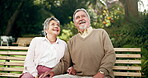 Senior couple, park and happy in bench for bonding, love and retirement in New York. Relationship, people and smile with looking up as pensioner for mindfulness, trust and support in outdoor