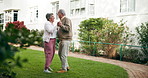 Dancing, senior couple and happy in garden for love, retirement and pride for date together. Elderly man, woman and connection in backyard of nursing home or nature for anniversary and wellness