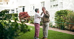 Dancing, elderly man and woman in garden for love, retirement and pride for date together. senior couple, happiness and connection in backyard of nursing home or nature for anniversary and wellness