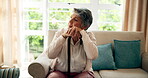 Depressed, thinking and senior woman with cane on sofa for sad, memory or nostalgia in living room. Thoughtful, elderly and person with walking stick for regret, grief or remember in retirement home