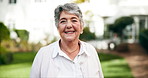 Face, outdoor and senior woman with smile, retirement and happiness with weekend break. Portrait, pensioner and elderly lady in park, old age and calm with peace, active and positive mindset