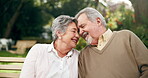 Senior couple, park and forehead touch in bench for bonding, love and retirement in New York. Relationship, people and happy or smile as pensioner for mindfulness, trust and support in outdoor