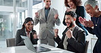 Businessman, applause and team with laptop for congratulations, winning or promotion at office. Happy man, young employee or group clapping on technology for achievement, deal or success at workplace