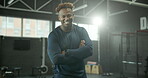 Arms crossed, fitness and smile with man in gym for start of exercise, training or workout routine. Challenge, confident and portrait of happy African person in health club for physical performance