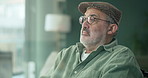 Senior man, window and thinking with glasses for memory, dream or reminisce in living room at home. Elderly male person in retirement, wonder or thought for reflection, past or imagination at house