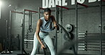 Strong, battle rope or black woman in gym for body health, fitness training or cardio exercise challenge. Development, arm muscle or African girl athlete with wellness, mobility workout or energy