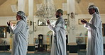 Praying, muslim and group with open hands in mosque for spiritual reading, religious worship and Urdu. Islamic people, palms or holy building for Gaza hope, faith and trust in community solidarity