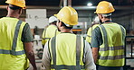 Walking, engineering and teamwork of people in warehouse with wood, lumber or material production. Back of group and supervisor in factory with safety gear for inspection, manufacturing and progress