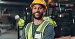 Happy, worker and helmet of man in construction, safety and industry of engineering, face and building. Industrial, confident or portrait of person, smile and joy of employee in factory and warehouse