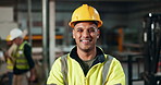 Helmet, worker and face of man in construction, safety and industry of engineering, uniform and building. Industrial, happy and portrait of person, smile and joy of employee in factory and warehouse