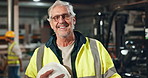 Helmet, worker and mature man in construction, safety and industry of engineering, face and building. Industrial, happy and portrait of person, smile and joy of employee in factory and warehouse