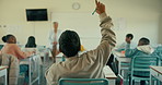 School, questions and class with student, teacher and with ideas for growth, development and education. Study, learning and child from back with hands up for knowledge, exam and curious boy at desk