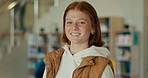 Smile, school and portrait of teen girl with backpack for education, growth or development on campus. Happy, face and happy student in hallway of learning academy with confidence, pride and knowledge