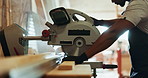 Man, circular saw and timber for construction, building or project for material, craft or supplies. Male person, woodcutter and manufacturing for contractor, development or carpentry in warehouse