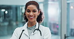 Face, woman or doctor in healthcare with arms crossed, about us and medical pride for cardiologist. Hospital, female employee and confidence as professional expert for helping, support and assurance