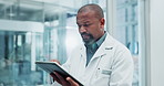 Black man, doctor and tablet in clinic for healthcare, appointment and schedule for telehealth. Technology, medical professional and online for advice, results and patient records in hospital