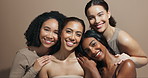 Face, together or hug for friends, skincare or wellness for diversity, inclusion or support in studio. Makeup, happy or confident women with facial glow, beauty results or smile on brown background