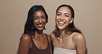 Laughing, women and beauty face with friends, diversity and cosmetics in studio with makeup. Youth, happy and portrait with solidarity, skincare and glow with smile and skin shine with care and pride