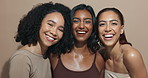 Face, women and diversity for glow, skincare or wellness with multicultural, inclusion for cosmetics. Female people, healthy skin and happy with results, beauty for dermatology in studio background