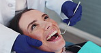 Dentist, hands and mirror in mouth for consultation, patient examination and oral inspection for routine checkup. Woman, dental tool and assessment for cleaning, procedure and teeth whitening or care