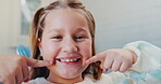 Smile, girl and dentist in clinic for dental health, face and consultation for toothache or braces. Teeth, happy and oral hygiene or wellness for female patient person, office and doctor for children