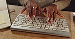 Computer, keyboard and hands of woman in typing for research, notes and ideas for online article. Editing, office and female journalist at desk writing web review, report or agenda for business plan