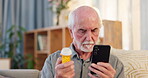 Elderly man, phone and checking pills on internet for ingredients, side effects and required dosage in nursing home. senior person, tech and typing with pain medication for health, bottle and advice