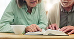 House, hands and old couple with bible, religion and communication for holy scripture, teaching and belief. Closeup, mature man and senior woman with spiritual bonding, worship and faith for guidance