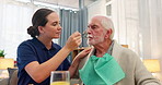 Old man, nurse and feeding patient with healthcare, assist and nutrition in elder home. Professional, caregiver and senior person with support, empathy and nursing with rehabilitation, help and food