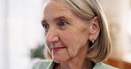 Smile, face of senior woman and thinking in nursing home for memory, good news or nostalgia in living room. Happiness, retirement or elderly female person in lounge for health, life insurance or care