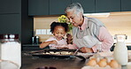 Child, grandmother and baking or helping in house, bonding and teaching girl culinary skills with family kitchen. Happy, education and dough on table, cookies ingredients and development in apartment