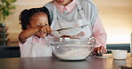 Girl, sifting and woman baking in kitchen, child development and teaching culinary skills with family. Education, happy and excited for flour ingredient in bowl for preparation, recipe and smile