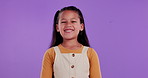 Happy girl, child and face in studio with confidence, excited and joy for back to school, learning or education. Cool and trendy kid in portrait, smile and creative development on purple background