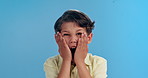 Scream, surprise and face of child on blue background for news, announcement and information. Shock, childhood and portrait of young boy with facial expression, emoji reaction and wow in studio