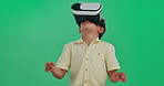 Child, vr and future with green screen for interaction, 3D experience or virtual world on studio background. Young kid or little boy looking around in metaverse for futuristic game or entertainment