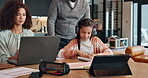 Dad, daughter and studying in kitchen, tablet and questions of maths, mom and writing on notebook.  Elementary school, practice and teaching in home, growth and development of child and knowledge