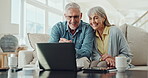 Mature couple, home and happy with technology for asset management or retirement planning on sofa. Man and woman on laptop or digital technology for results on investment, insurance or property value