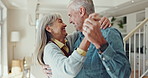 Dancing, love and elderly couple with hug in living room for happiness, relationship or care. Smile, married man and senior woman with retirement for movement, embrace or bonding together in home