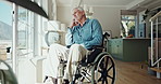 Wheelchair, thinking and senior man in home for depression, nostalgia and reflection in living room. Sad, retirement and person with disability with thoughtful memory, ideas and wonder in house