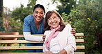 Women, nurse and senior patient in bench on portrait for help, support and happy with care in garden. People, smile and persioner with caregiver in healthcare, rehabilitation and exercise with fun
