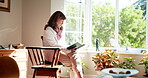 Senior woman, reading bible and peace in home, faith and words of God for spiritual support or jesus. Female person, book and scripture of holy spirit or gospel, catholic story and story for prayer 